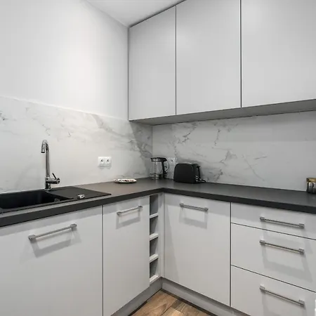 Maraton Gardens By Renters Апартаменты Познань